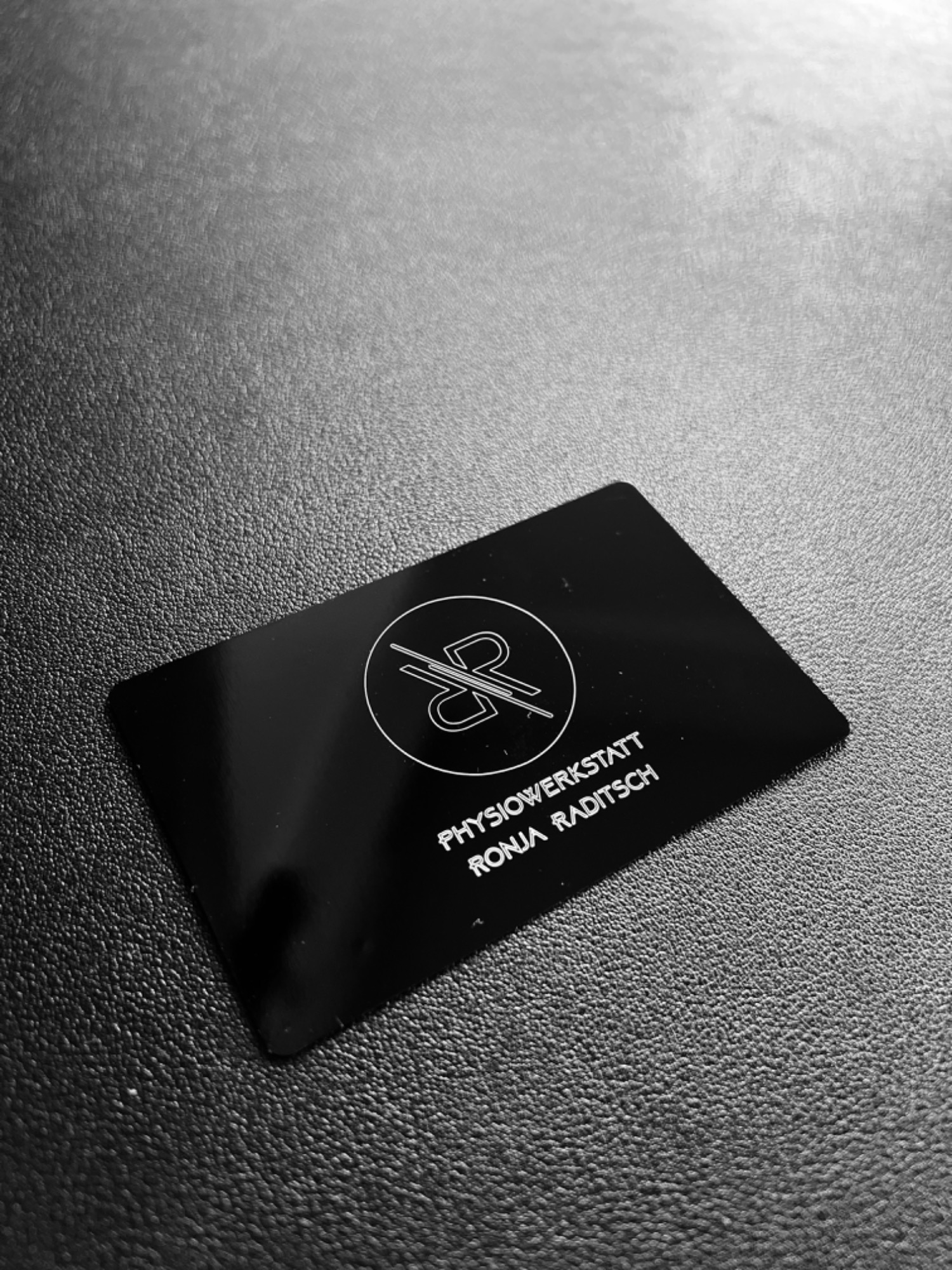 Laser-marked logo on metal card
